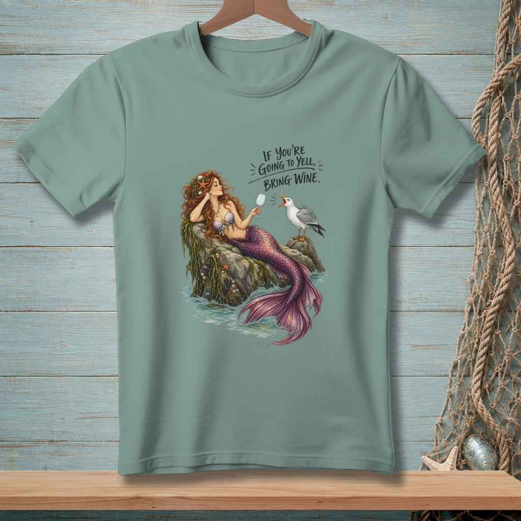 Mermaid on rocks with wine glass and seagull, text: If you're going to yell, bring wine.