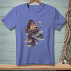 Purple t-shirt with illustration of a mermaid sitting on rocks holding a seashell and a fish.