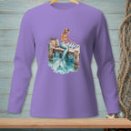 Long sleeve lilac shirt with a graphic of a mermaid sitting on a dock.