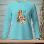 Teal long-sleeve shirt with a mermaid and lobster graphic and text "BE SO SERIOUS."