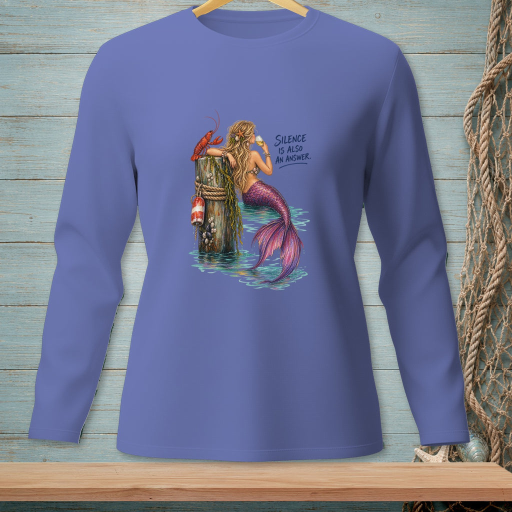 Mermaid with lobster and text "Silence is also an answer" on purple shirt.