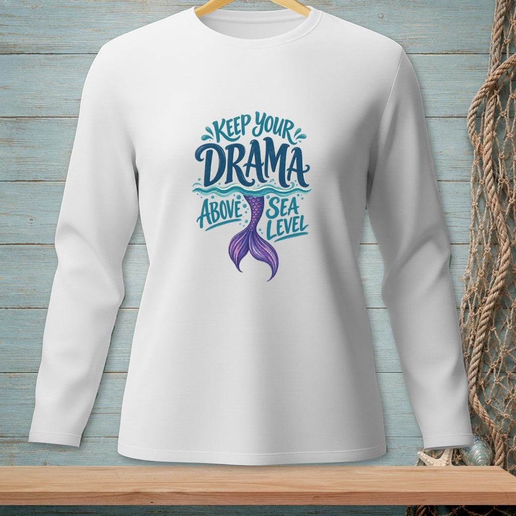 White long-sleeved shirt with "KEEP YOUR DRAMA ABOVE SEA LEVEL" text and mermaid tail graphic.