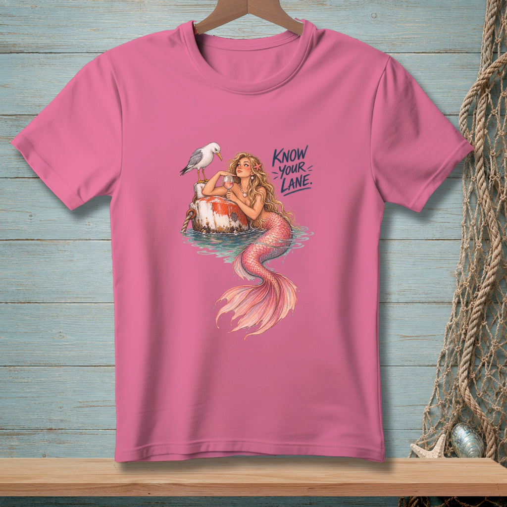 Pink t-shirt graphic with mermaid, seagull, and text "Know Your Lane".