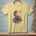 T-shirt with mermaid sitting on a rock with a crab and text.