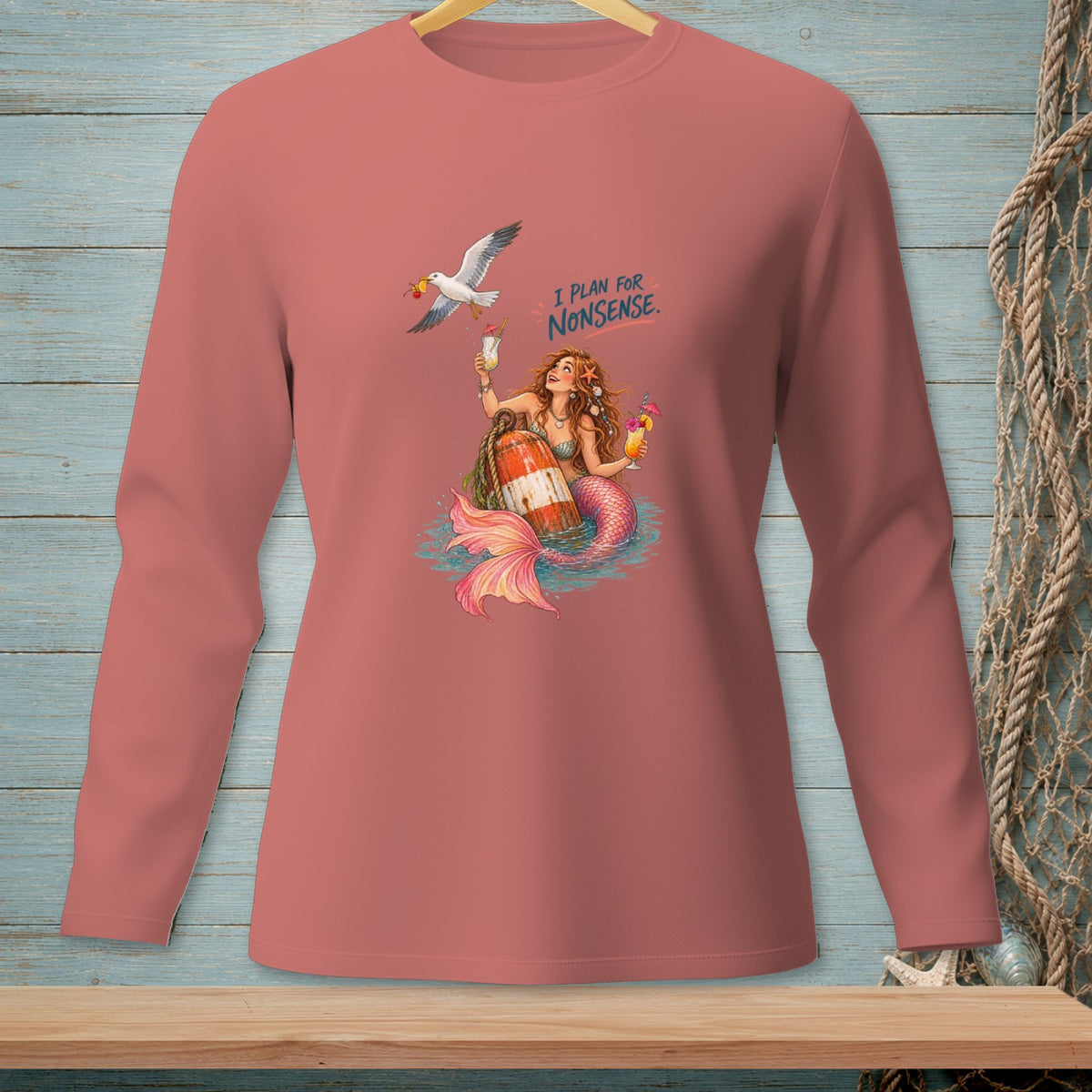 Mermaid with cocktails and a seagull holding cherries, with text "I PLAN FOR NONSENSE."