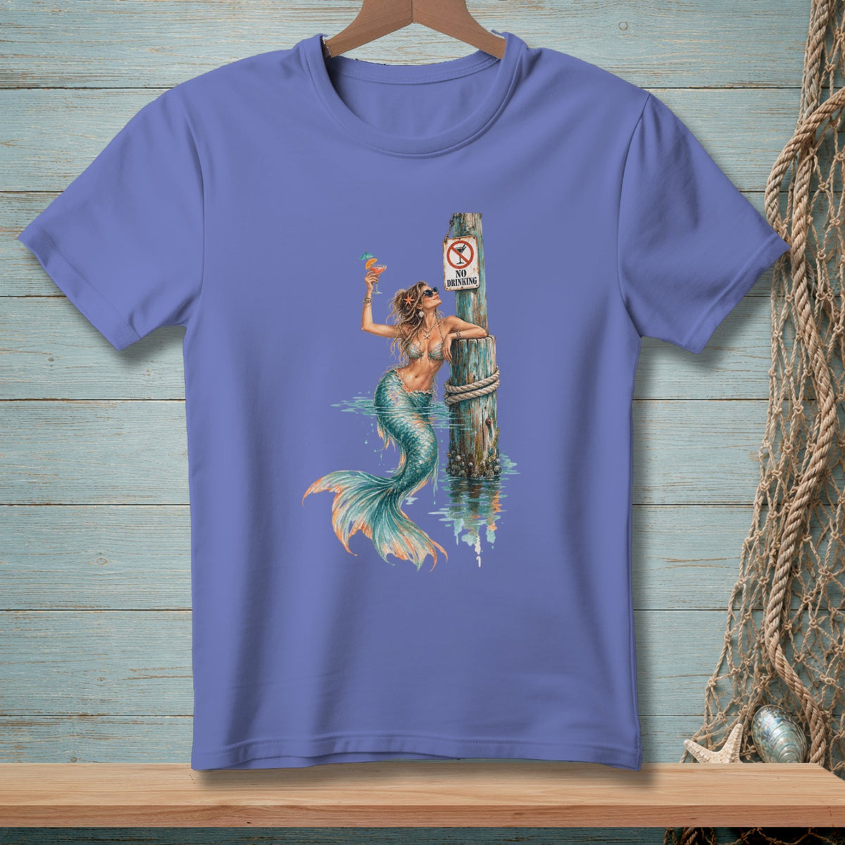 Mermaid with cocktail rests on a post with a "No Drinking" sign.