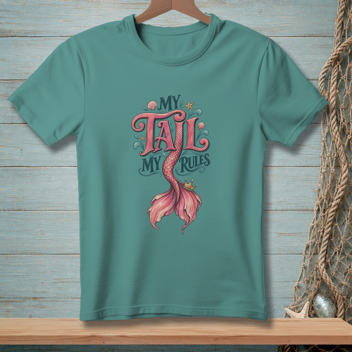 Teal t-shirt with a pink mermaid tail graphic and "My Tail My Rules" text.