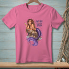 Pink t-shirt with a mermaid illustration and text "Salty Hair. Saltier Attitude."