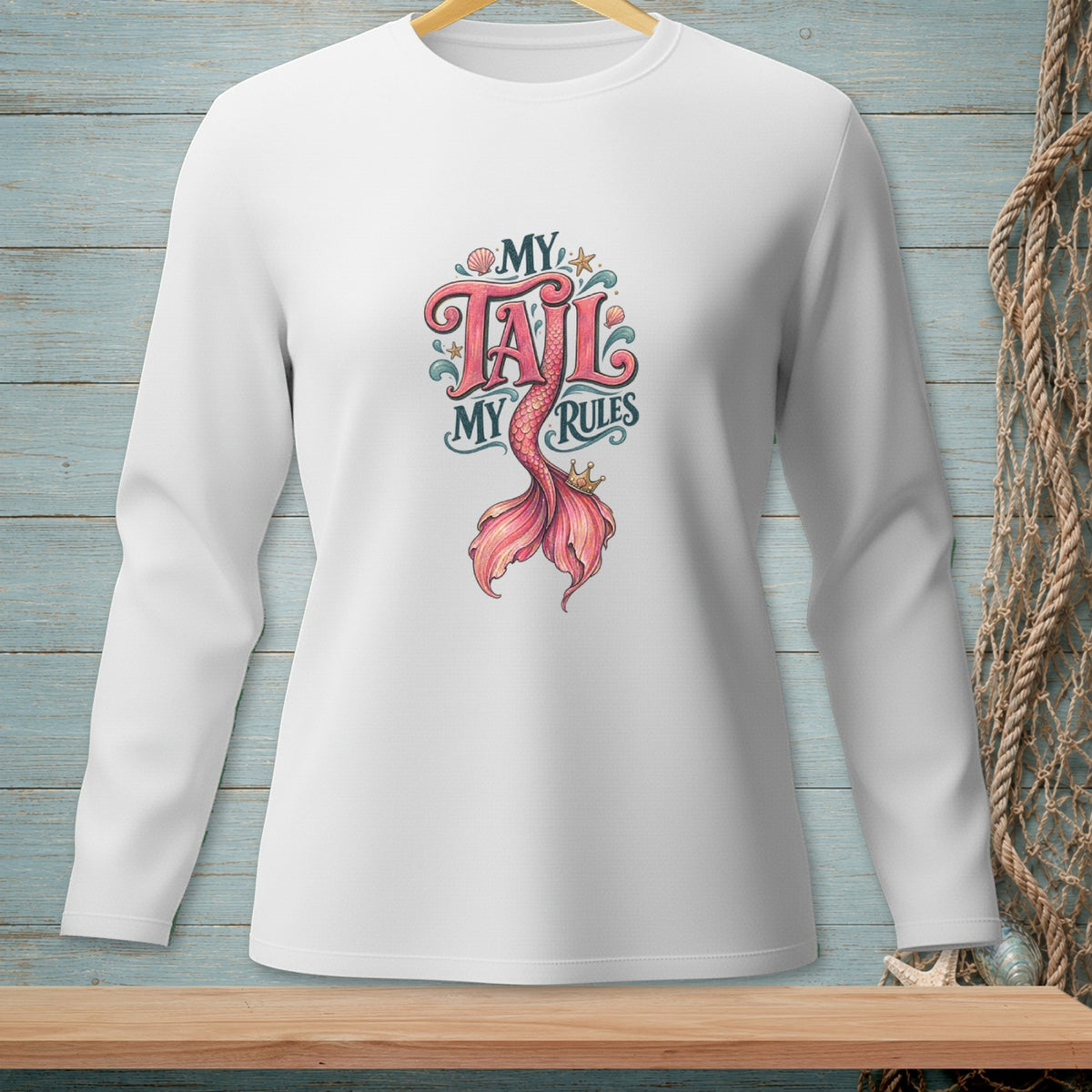 White long-sleeved shirt with "MY TAIL MY RULES" text and pink mermaid tail.