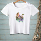 White t-shirt with illustration of a mermaid relaxing on a dock.