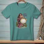 Mermaid with pufffish and text "PUFF HAPPENS" on teal t-shirt.