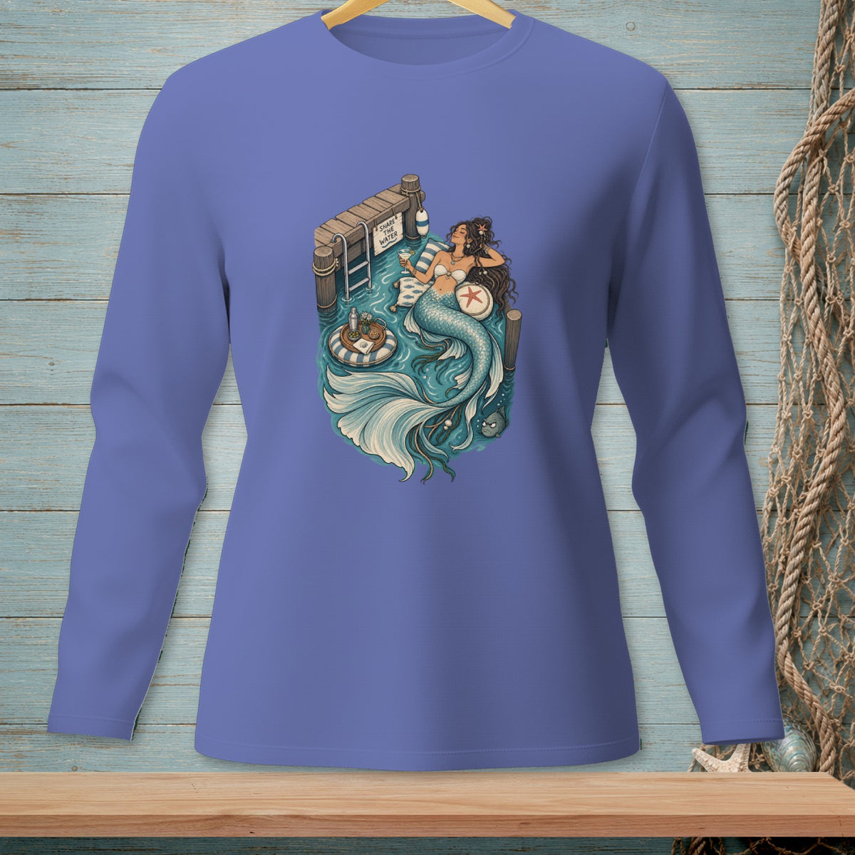 Mermaid lounging on a dock, "Share the water" sign, drink and snacks on float.