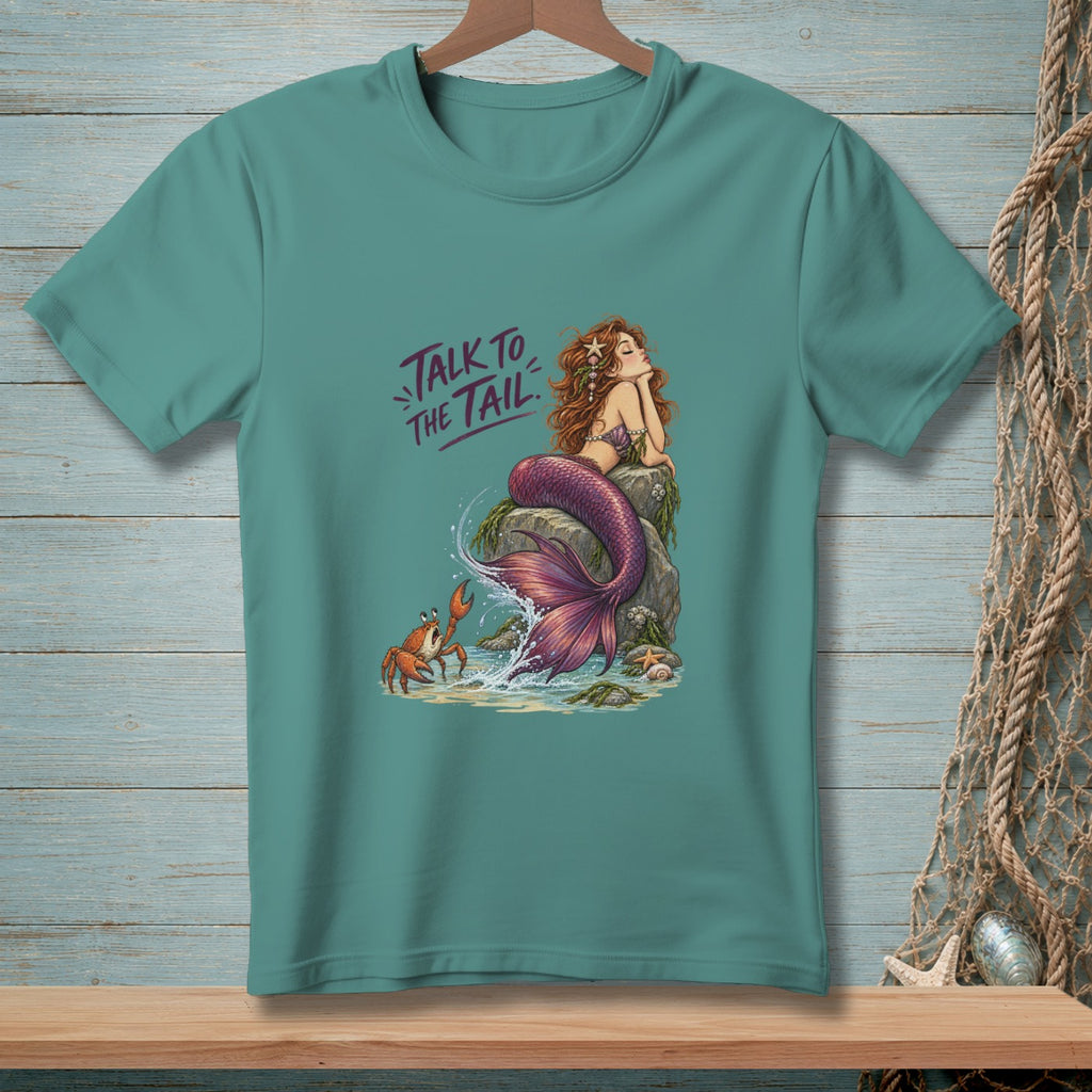 Teal t-shirt with mermaid illustration and "Talk to the Tail" text.