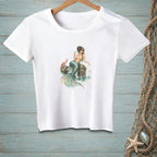 White t-shirt featuring a watercolor graphic of a mermaid with a cocktail and a crab.