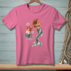 Pink t-shirt with mermaid, buoy, and crab graphic reading "Attitude Problem Not Mine."