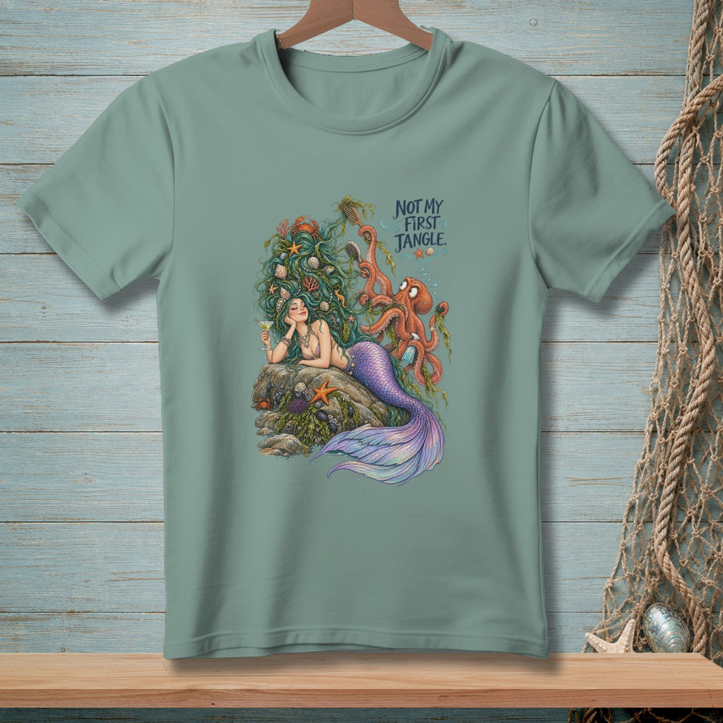 Mermaid with octopus, text "Not My First Jangle" on a teal t-shirt.