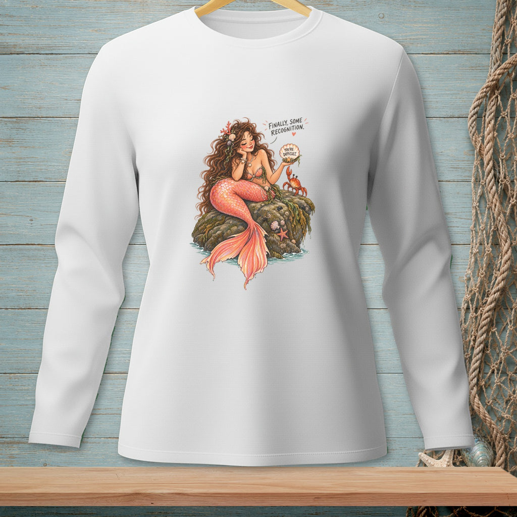 Illustration of a mermaid on a rock with a crab, text says "Finally, some recognition. You're difficult."