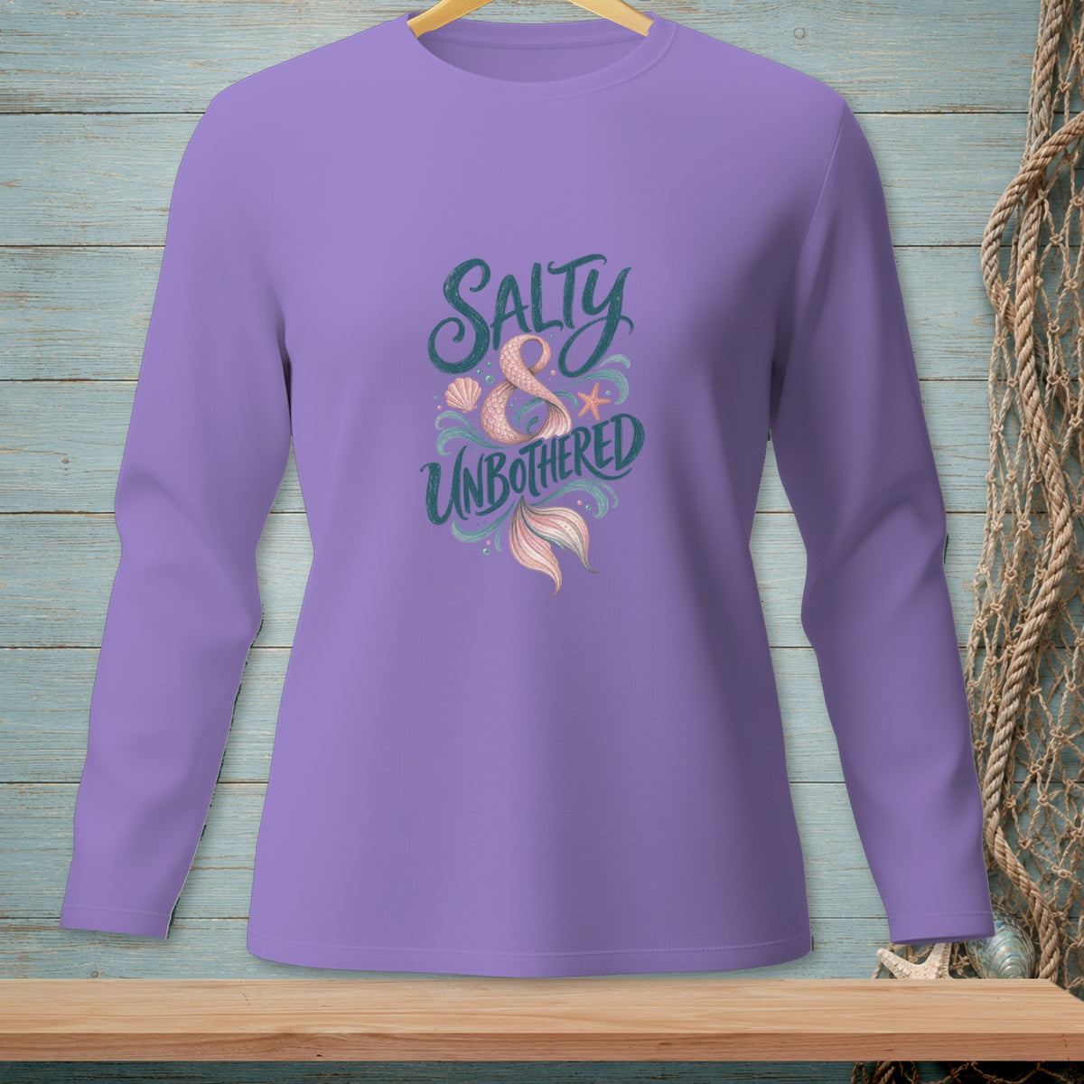 Purple long-sleeve shirt with "Salty & Unbothered" text and mermaid tail graphic.