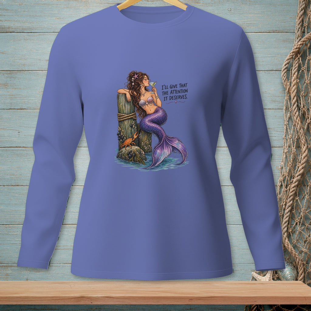 Mermaid with a drink on a pier, text reads "I'll give that the attention it deserves."