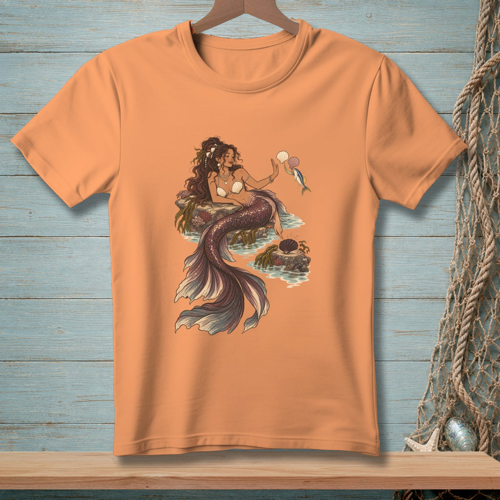 Orange t-shirt with a vintage illustration of a mermaid holding shells and a fish.