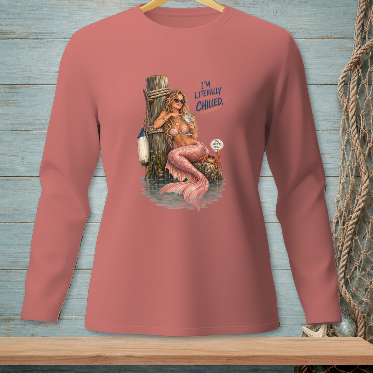 Mermaid with cocktail on dock, text "I'M LITERALLY CHILLED."