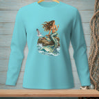 Teal long-sleeve shirt with a mermaid and seagull on a rock with waves.