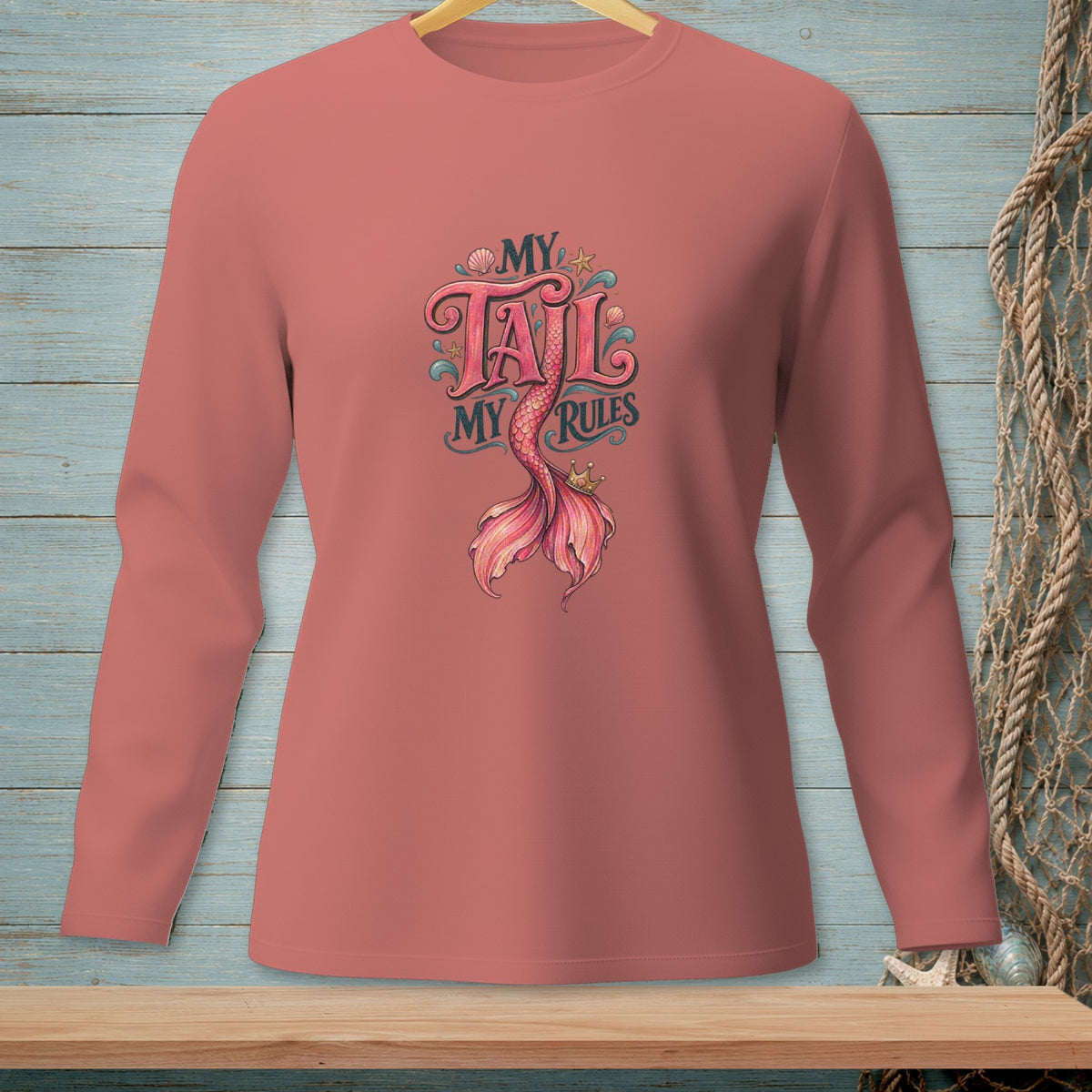 Salmon long sleeve shirt with "My Tail My Rules" mermaid graphic.