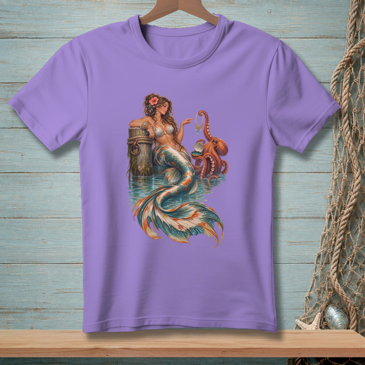 Purple t-shirt with a mermaid and octopus illustration on the front.