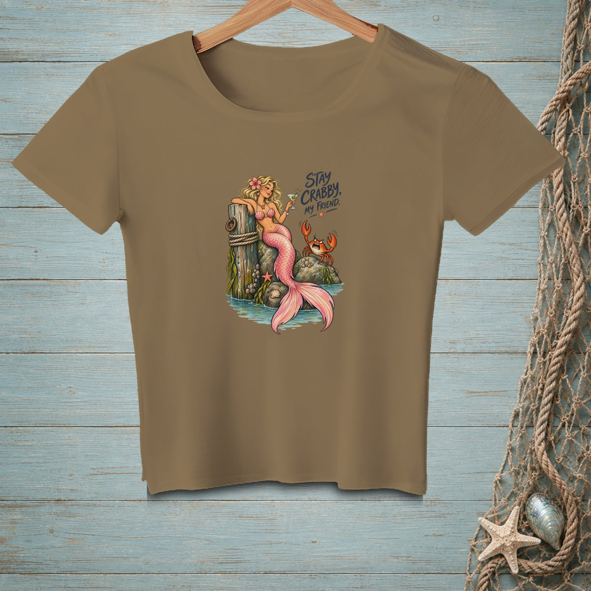 T-shirt graphic featuring a mermaid and crab with text "Stay Crabby, My Friend".