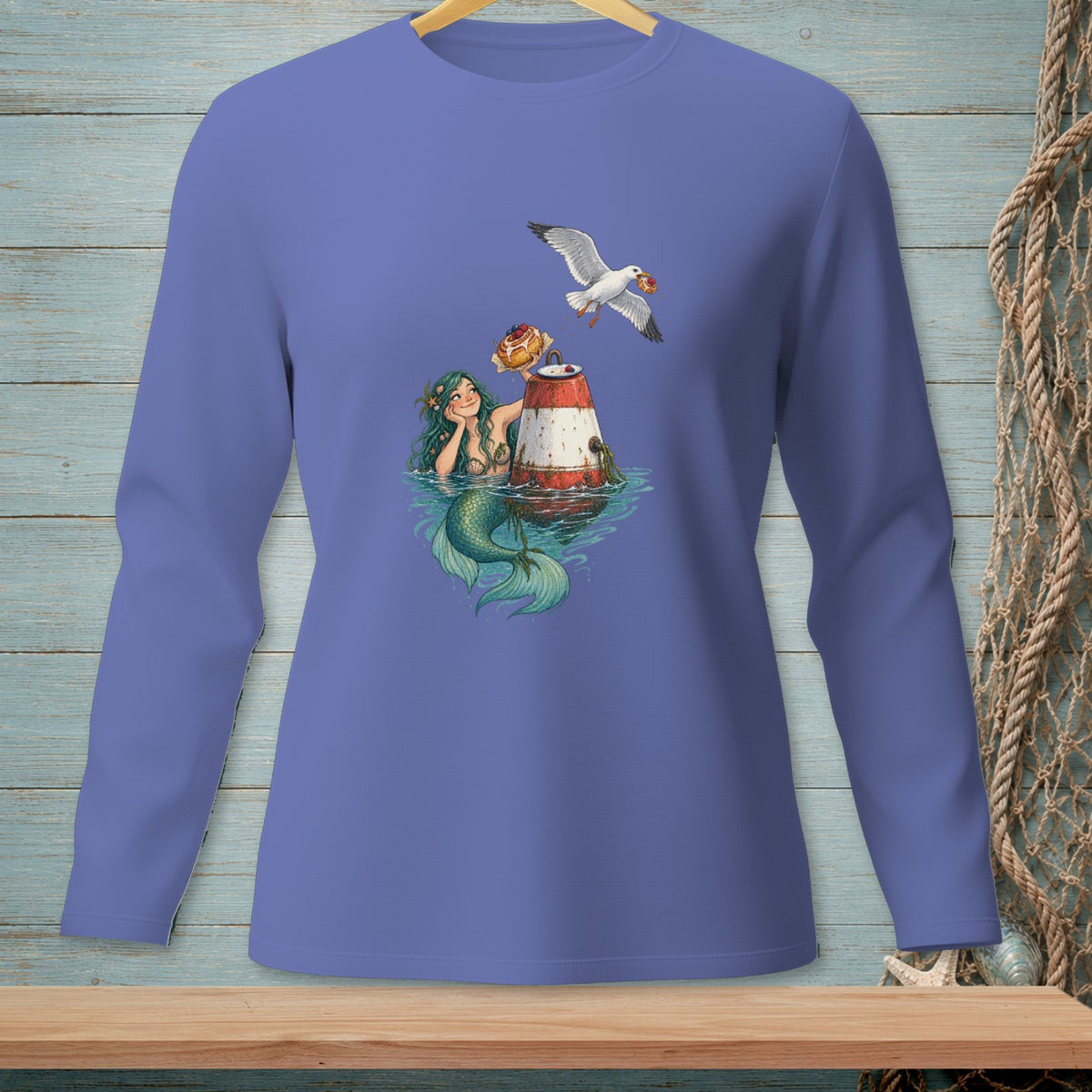 Mermaid with a pastry next to a buoy, while a seagull flies away with a pastry.