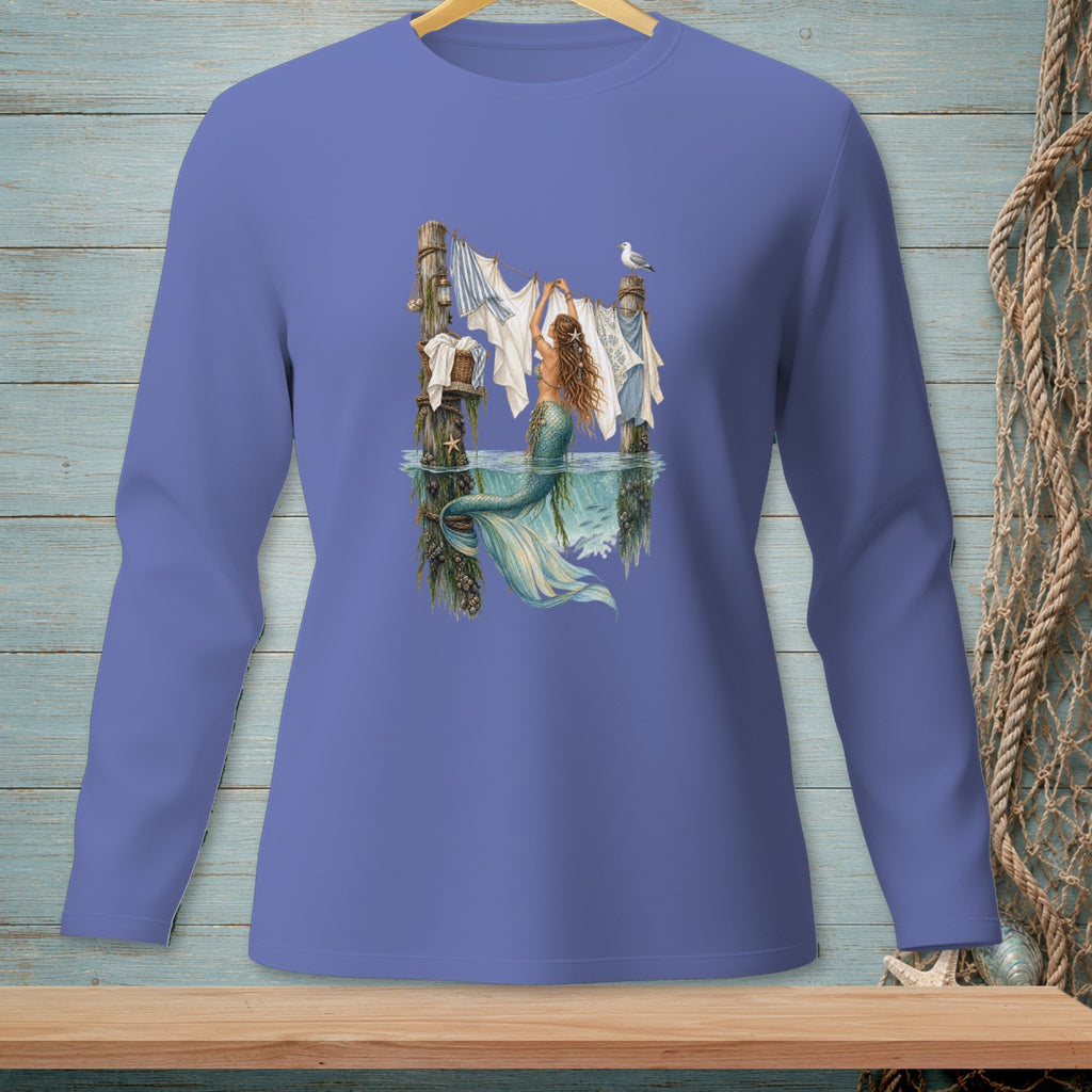 Long-sleeve shirt with a mermaid hanging laundry on a clothesline in the ocean.