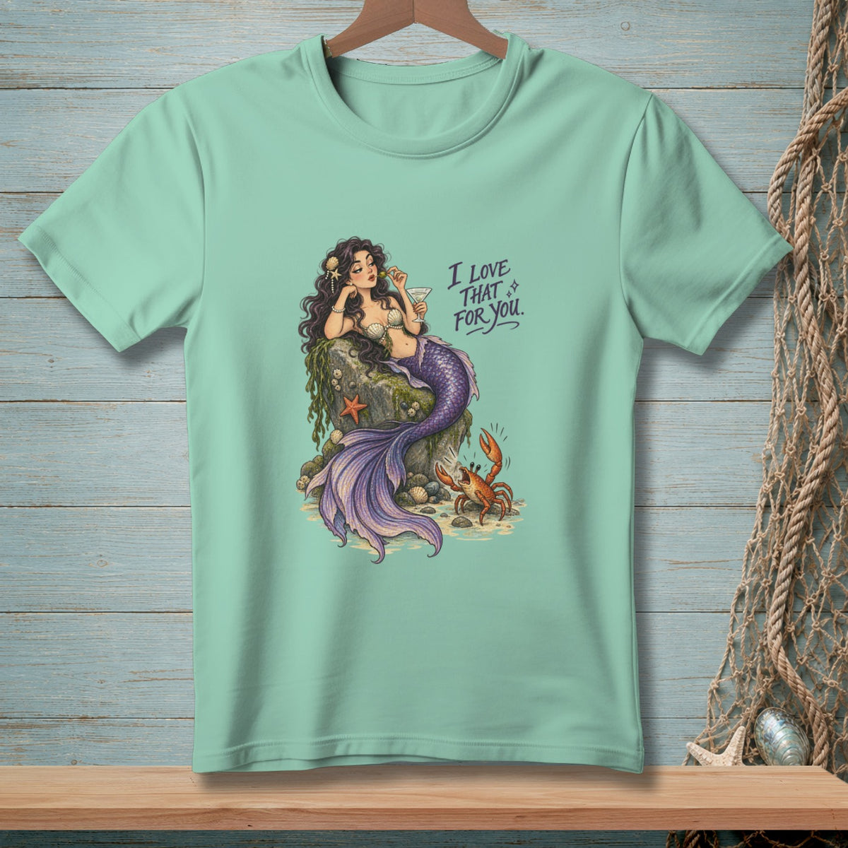 Mint t-shirt with mermaid, crab, and text "I Love That For You".