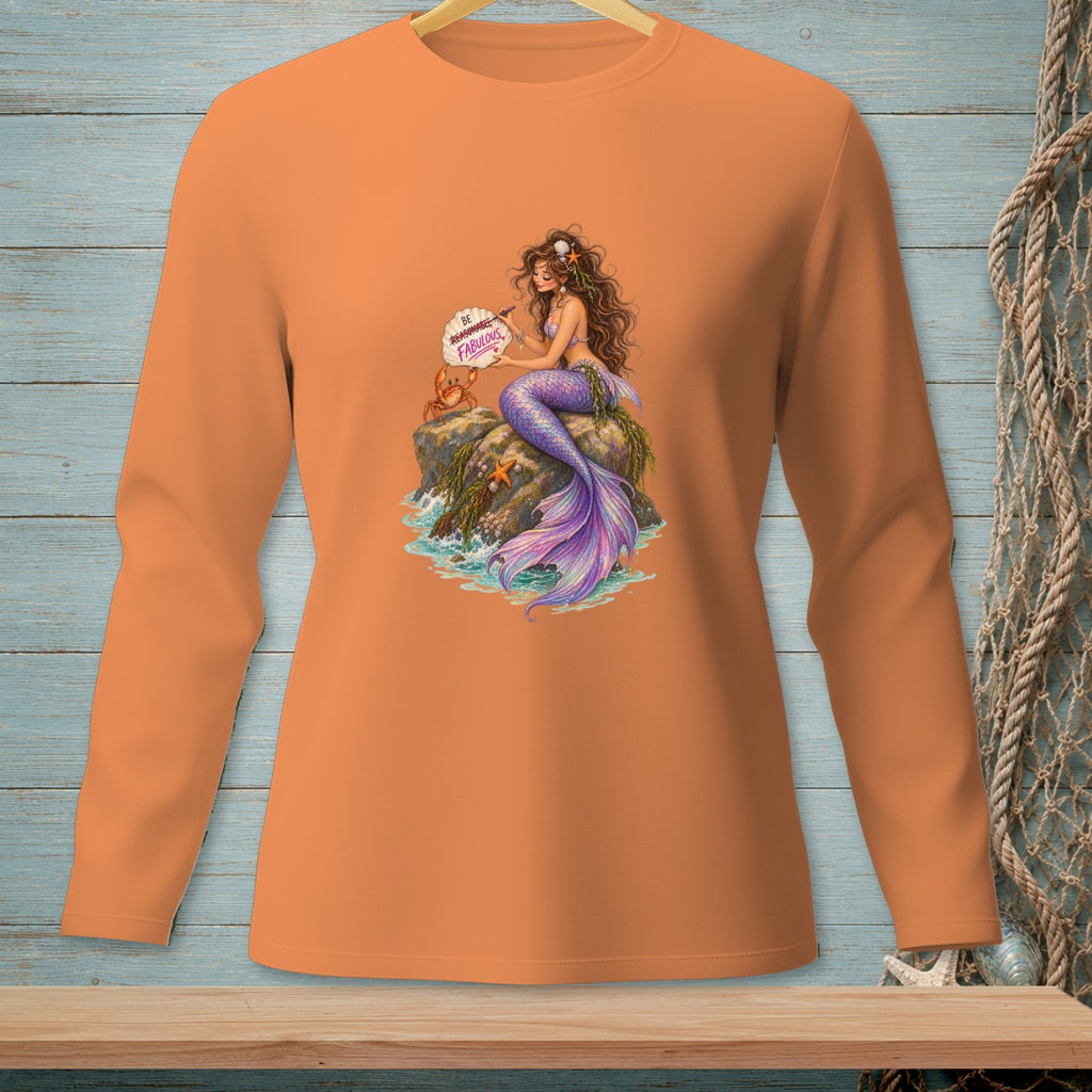 Long sleeve orange shirt with a mermaid holding a sign that says "Be Reasonable, Be Fabulous."