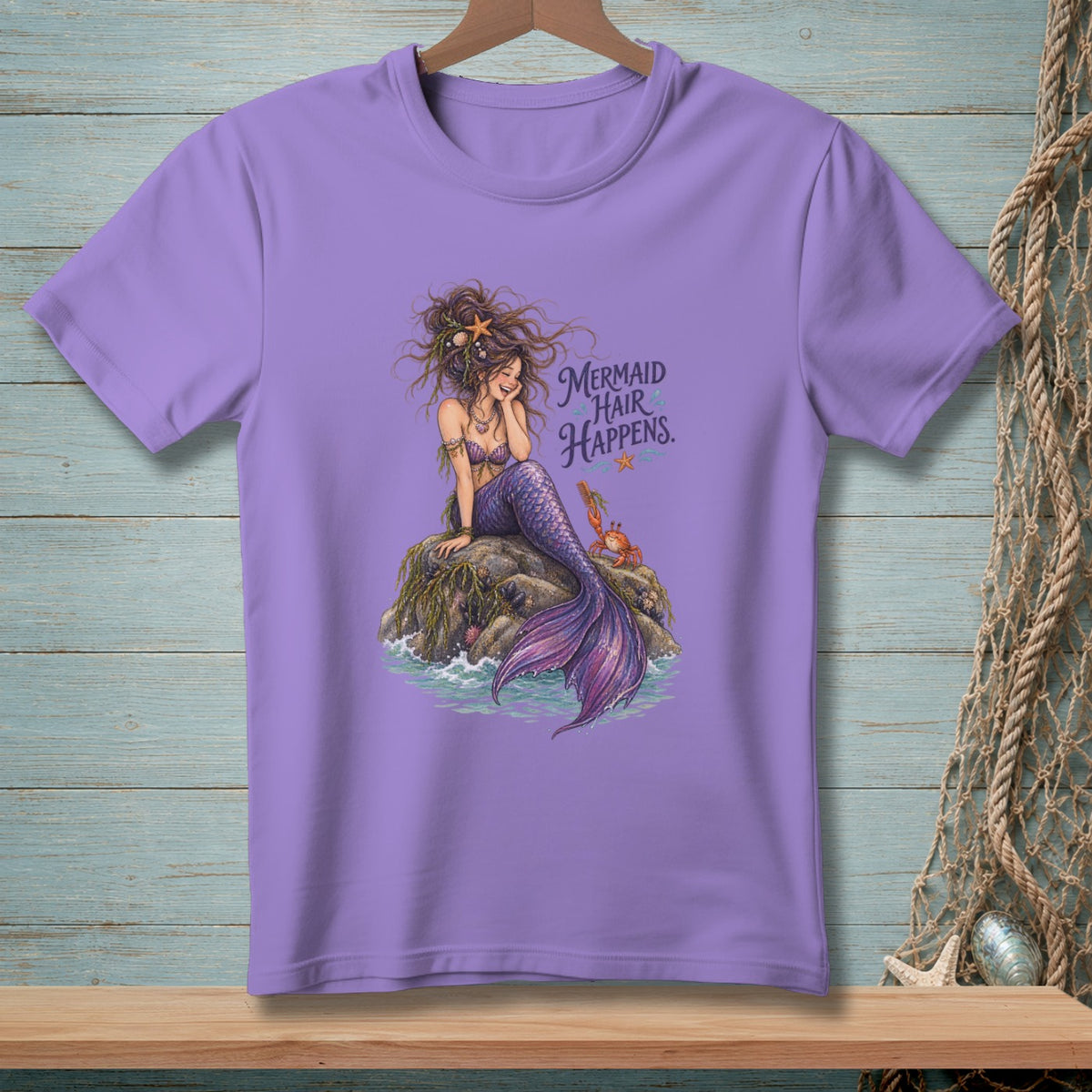 Lavender t-shirt with a mermaid illustration and "Mermaid Hair Happens" text.