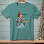 Mermaid with wine and books on a dock, text reads HANDLED.