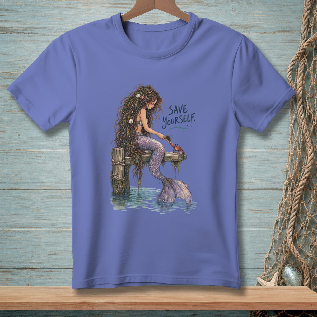 Mermaid sitting on pier brushing a crab with text "SAVE YOURSELF".