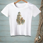 White t-shirt with a watercolor print of a lighthouse and a mermaid on a balcony.