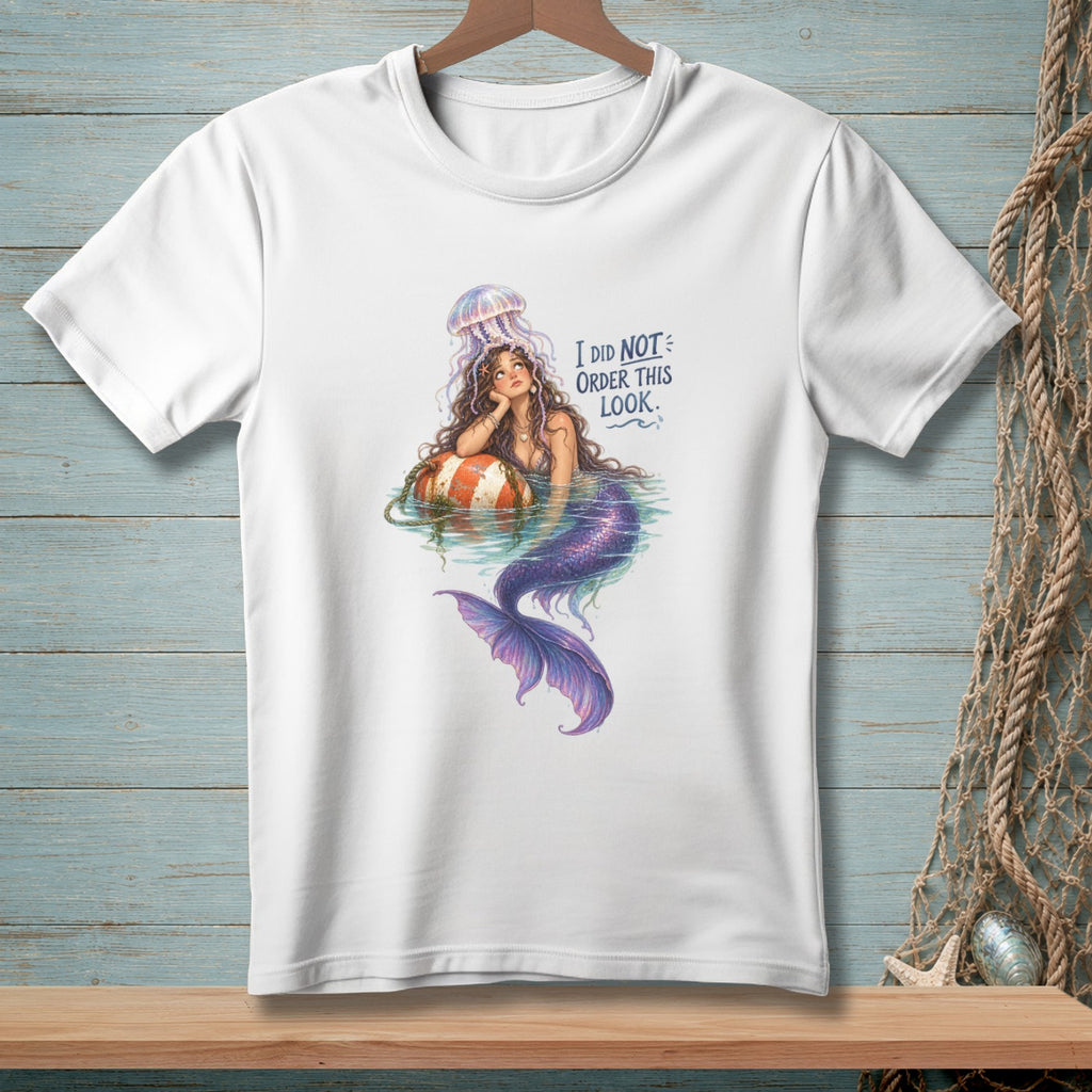 White t-shirt with a mermaid design and the text "I DID NOT ORDER THIS LOOK."