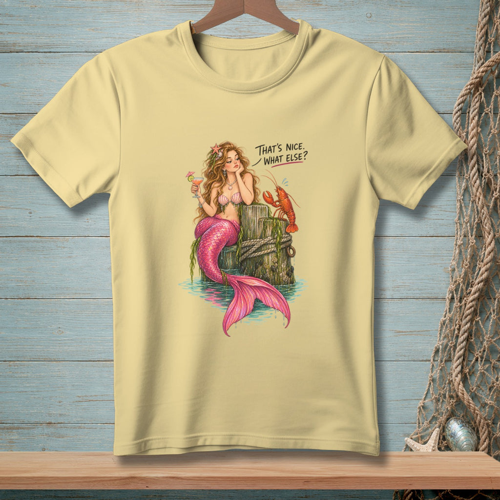 Light yellow t-shirt with mermaid and lobster graphic saying "That's nice. What else?".