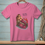 Pink t-shirt with a mermaid, lobster, and text reading "The Bar Was Low."
