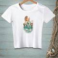 White t-shirt with a graphic of a mermaid on a dock with a "Share the Space" sign.