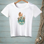 White t-shirt with a graphic of a mermaid on a dock with a "Share the Space" sign.