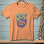 Orange t-shirt with "Mermaid Mode: Do Not Disturb" graphic featuring a mermaid tail.