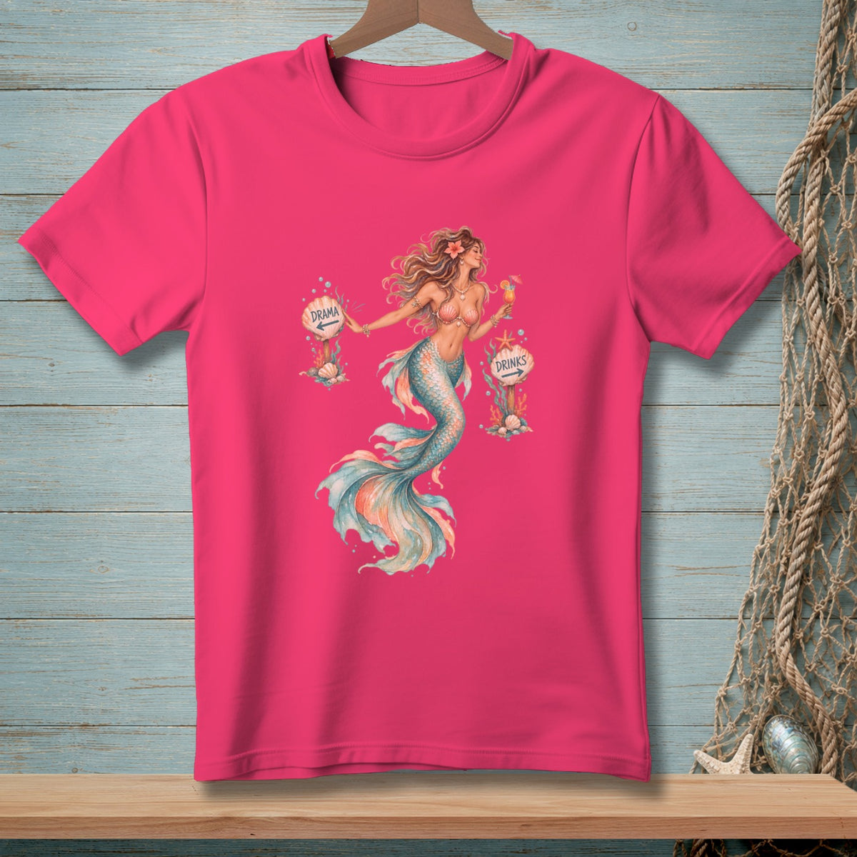 Pink t-shirt with mermaid graphic pointing to "Drama" and "Drinks" signs.