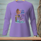 Lavender long sleeve shirt with mermaid and "Sea Hair: Zero Care" graphic.