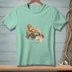 Mint green t-shirt with a mermaid lounging on a rock, holding an ice cream, and text "Plans Changed."