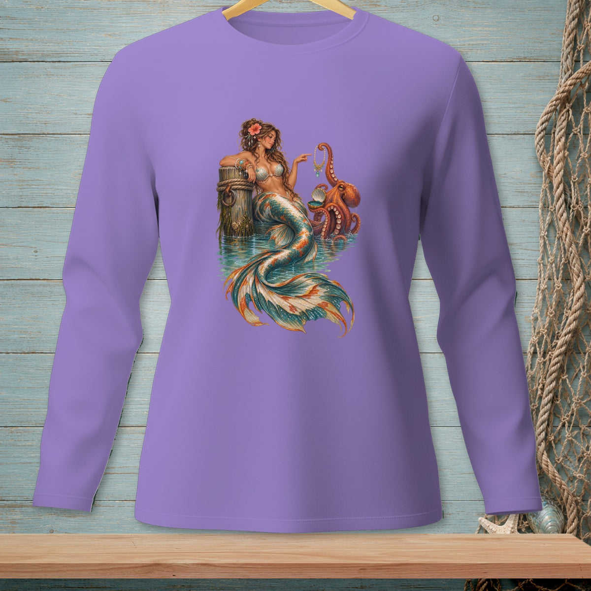 Purple long-sleeve shirt featuring a mermaid holding jewelry near an octopus.