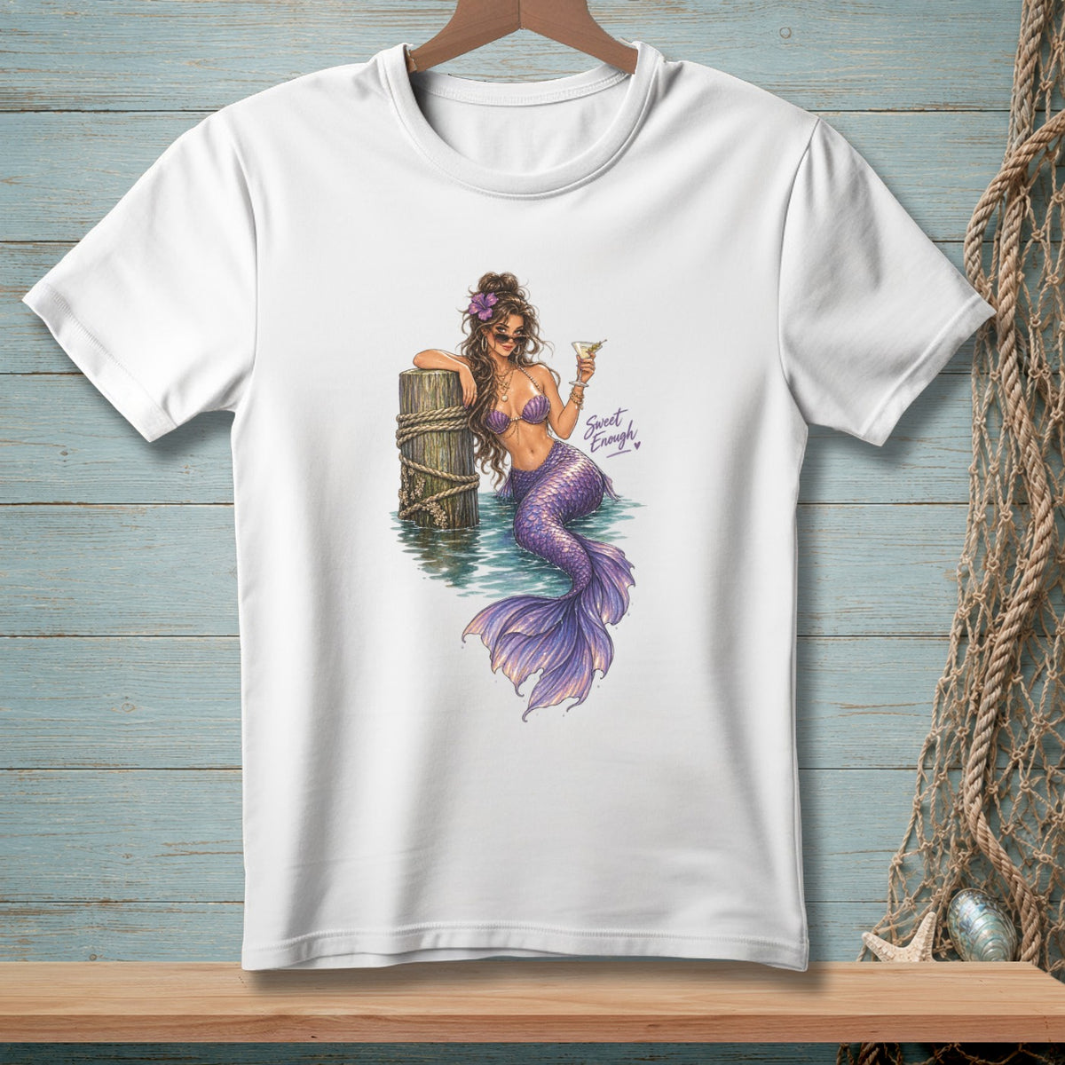 White t-shirt with mermaid graphic and "Sweet Enough" text.