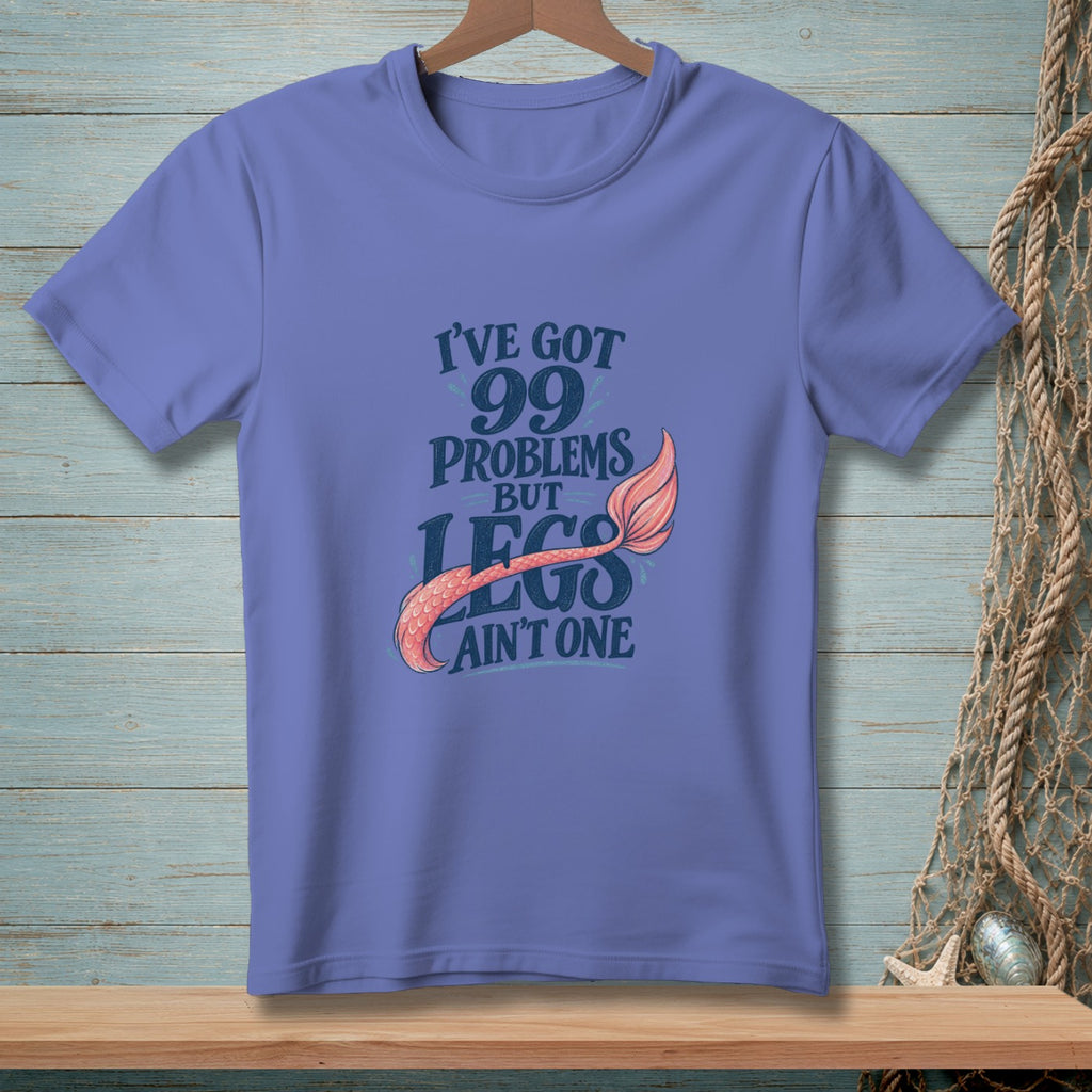 Purple t-shirt with text "I've got 99 problems but legs ain't one" and a mermaid tail.