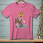 Mermaid sitting on rocks, holding a sign that says "Fix Your Expectations."